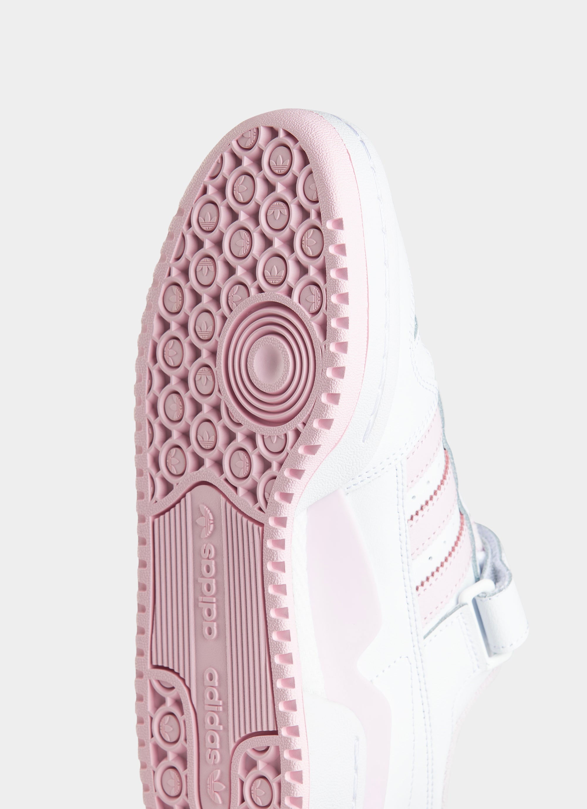 White adidas with pink on sale back