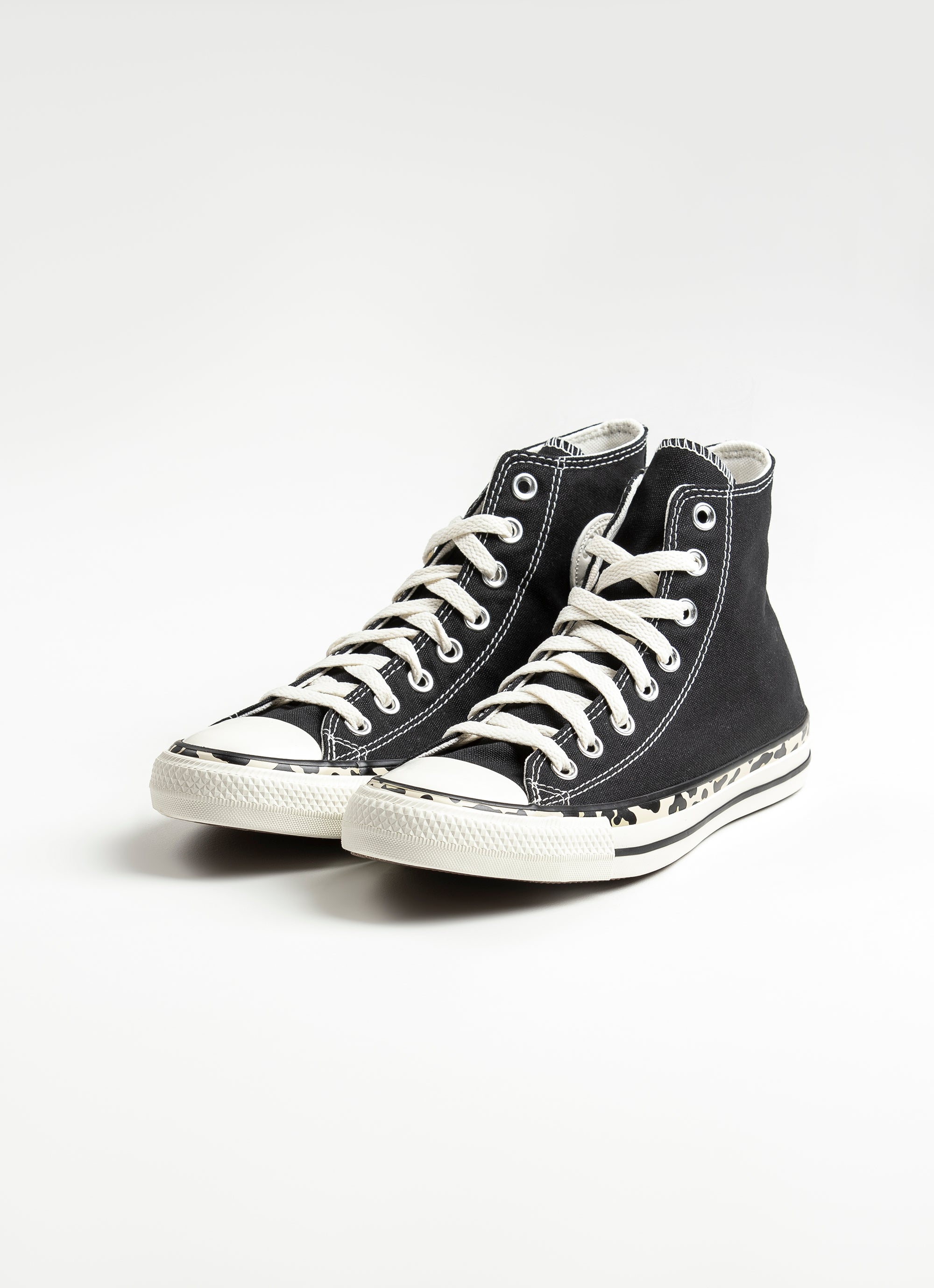 converse leopard edge