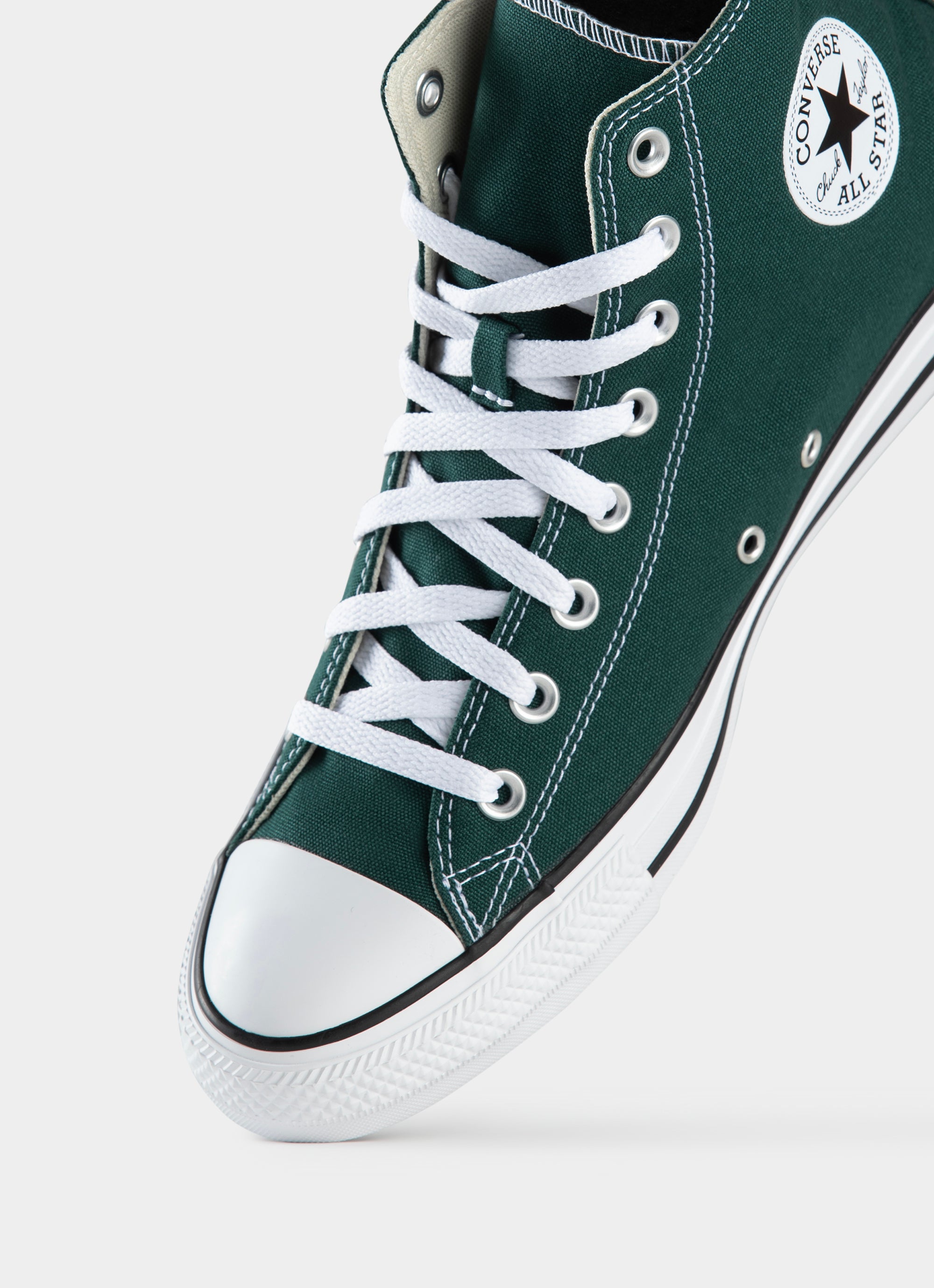 Dark green converse low on sale tops