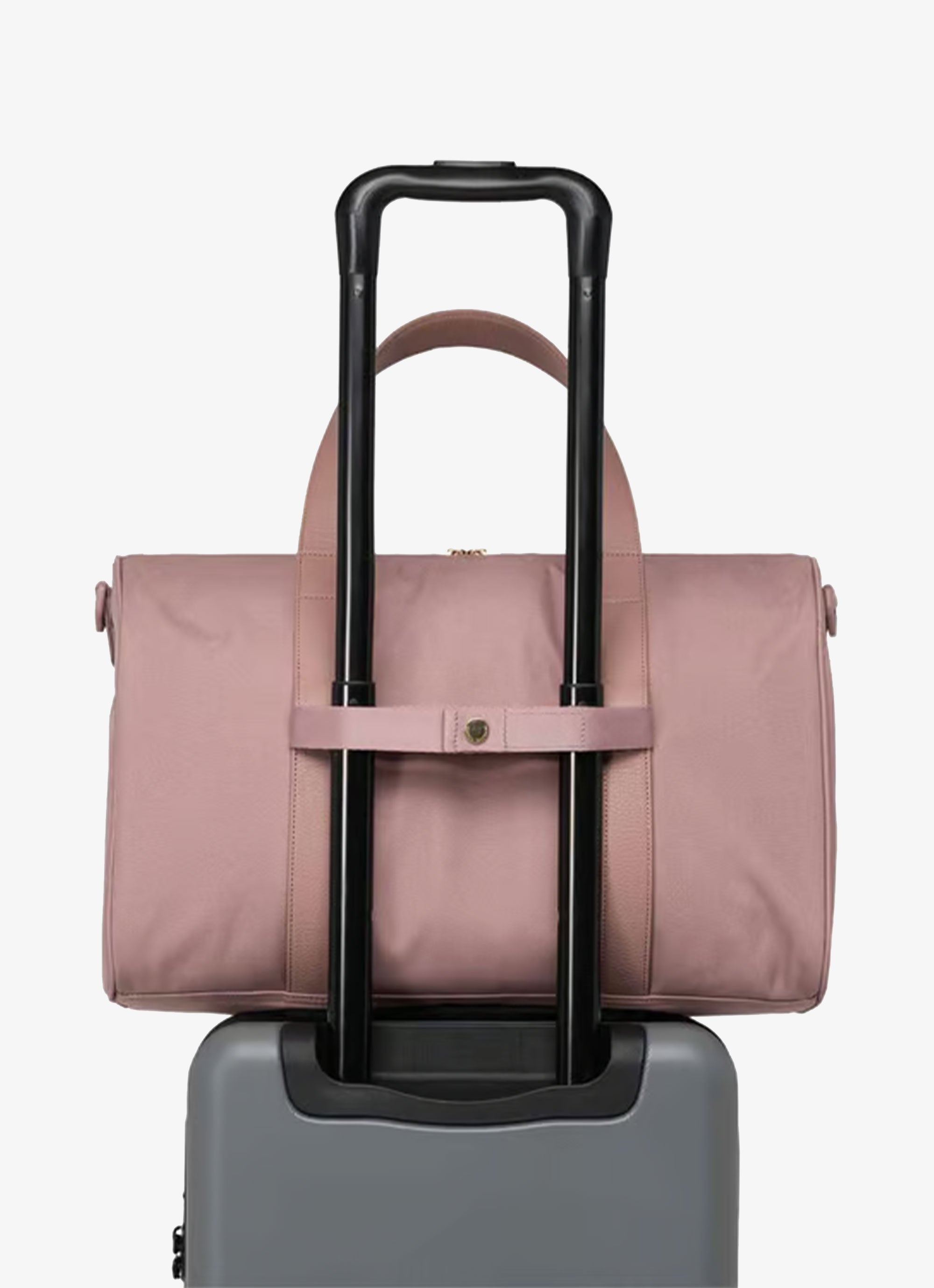 Herschel pink hotsell carry on