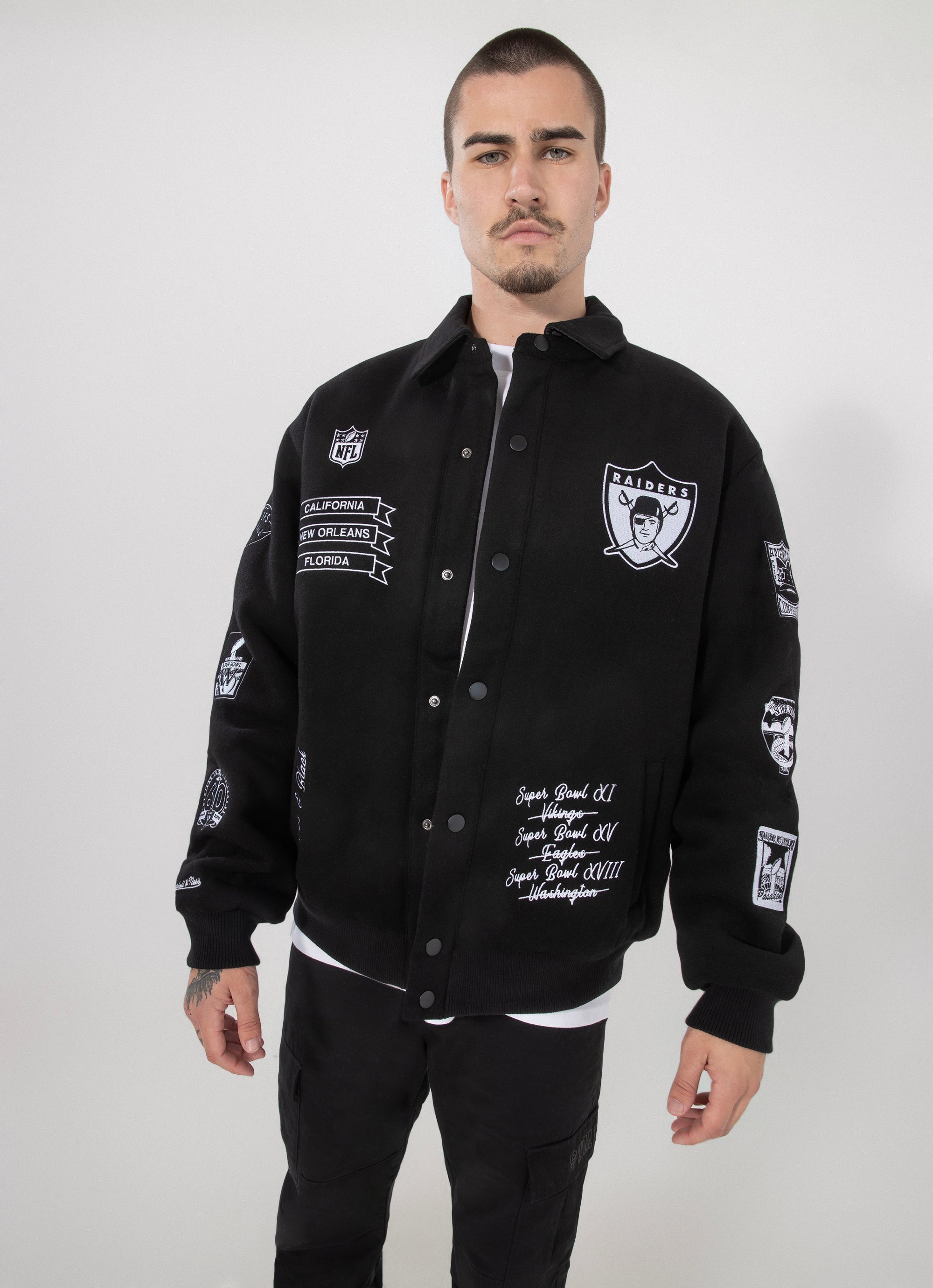 Raiders mitchell and ness jacket best sale