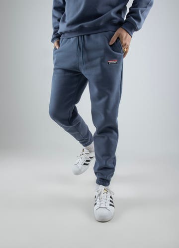 Stmnt Emblem Trackpant in Blue