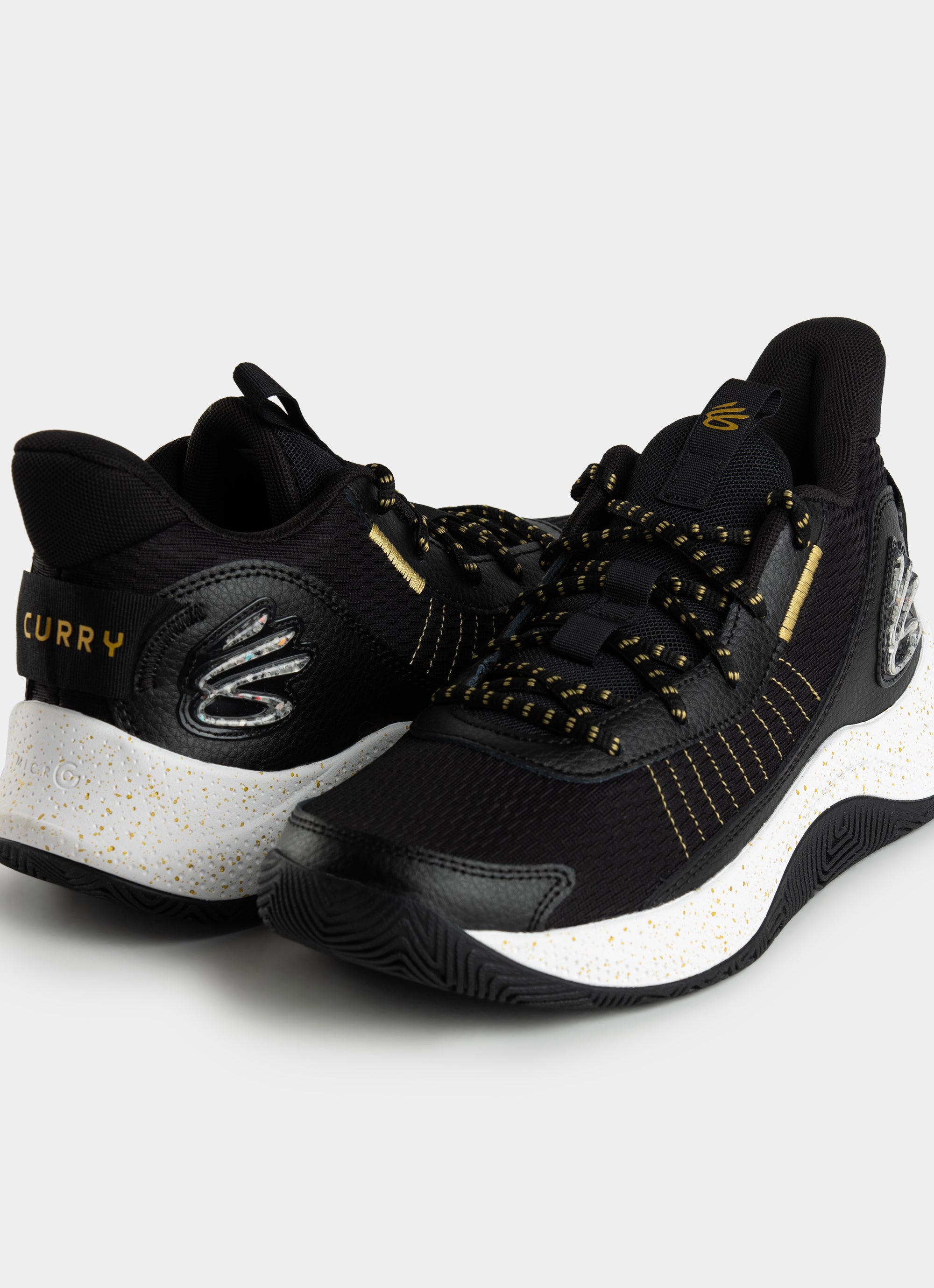 Under armour curry on sale black and gold